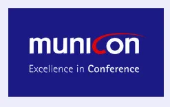 municon Logo auf blauem Hintergrund mit Schriftzug Excellence in Conference